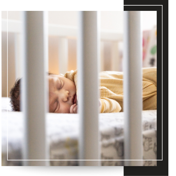 baby sleeping in crib
