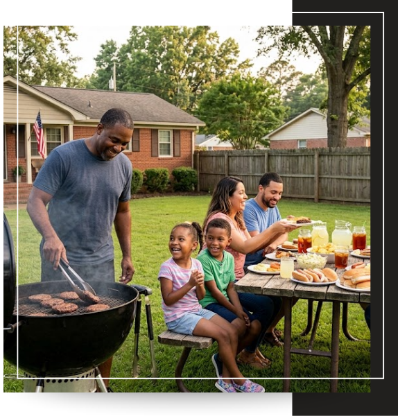 family enjoying outdoor bbq
